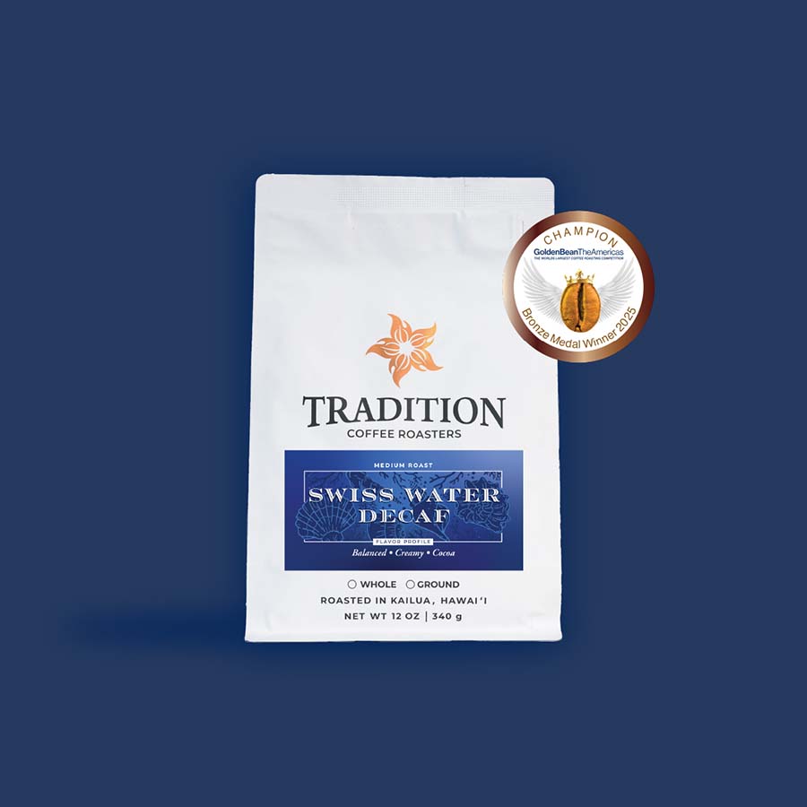 Tradition Coffee Roasters Swiss Water Decaf coffee package on a blue background